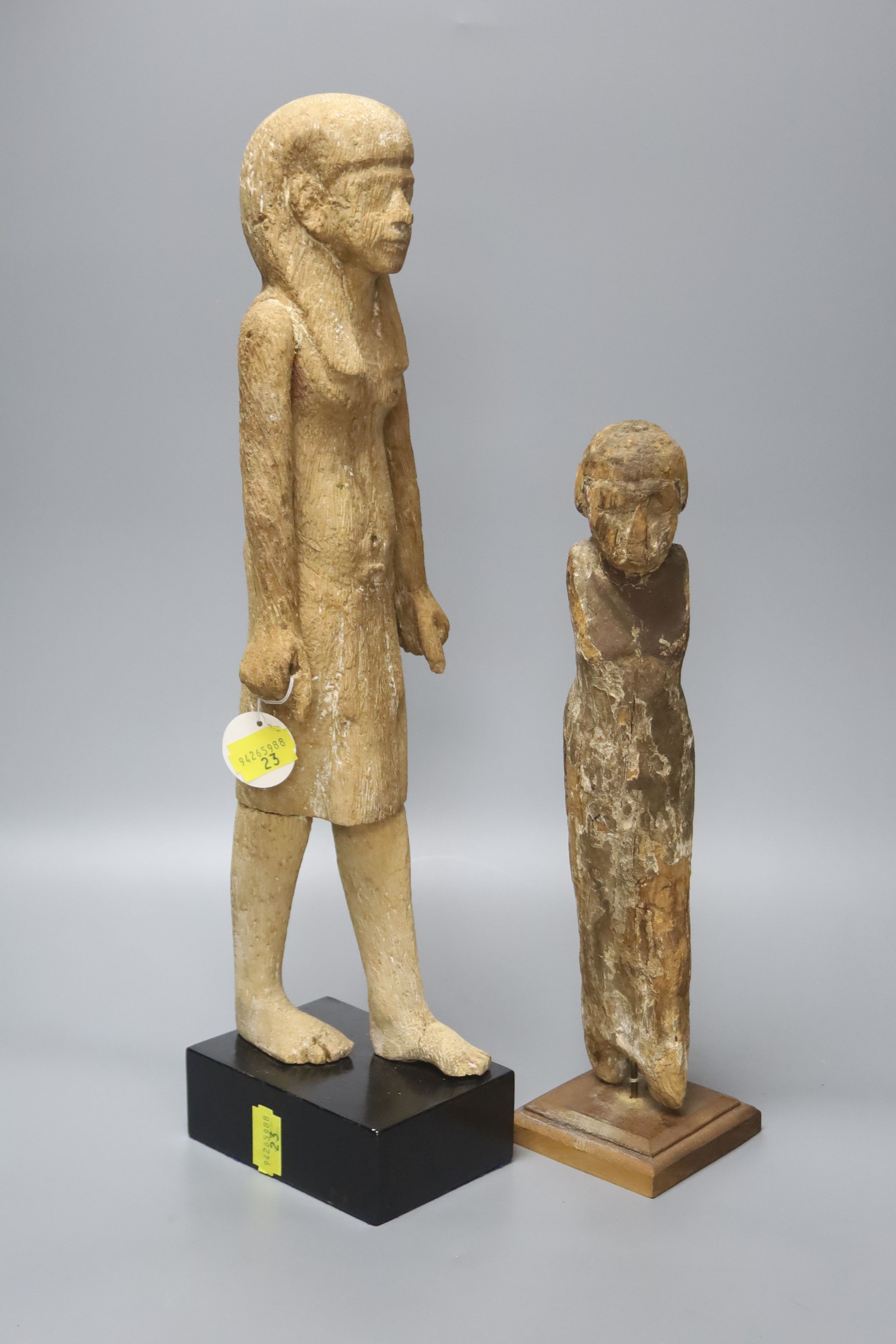 Two Egyptian wood figures, one possibly Coptic period